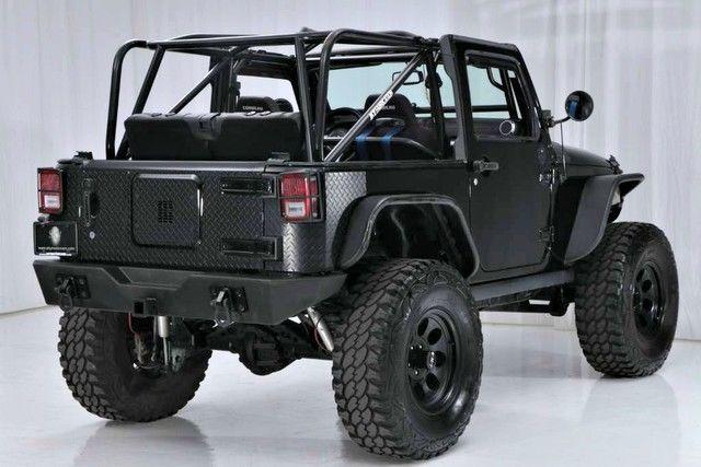 extremely modified 2015 Jeep Wrangler Freedom Edition Oscar Mike 4×4