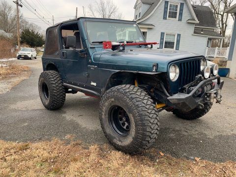 well modified 1998 Jeep Wrangler Sport 4&#215;4 for sale